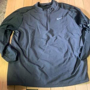 Men’s Nike 1/4 zip warm up dri fit. Used but excellent condition.